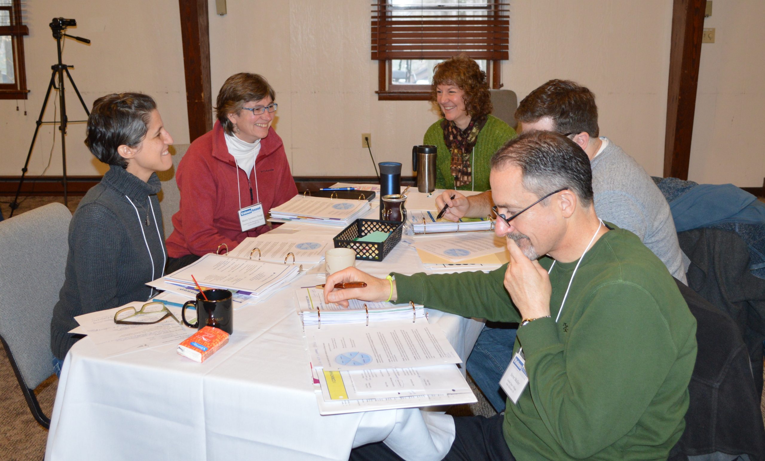 Participants in the Values-based Leadership Program discuss a presentation given during their February meeting. (Laurelville Mennonite Church Center photo)