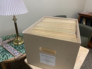 A box of labeled files in an article on home archival tips